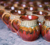 Handmade pottery coffee mugs in rustic red and green ash, great for tea, late, hot chocolate and juice